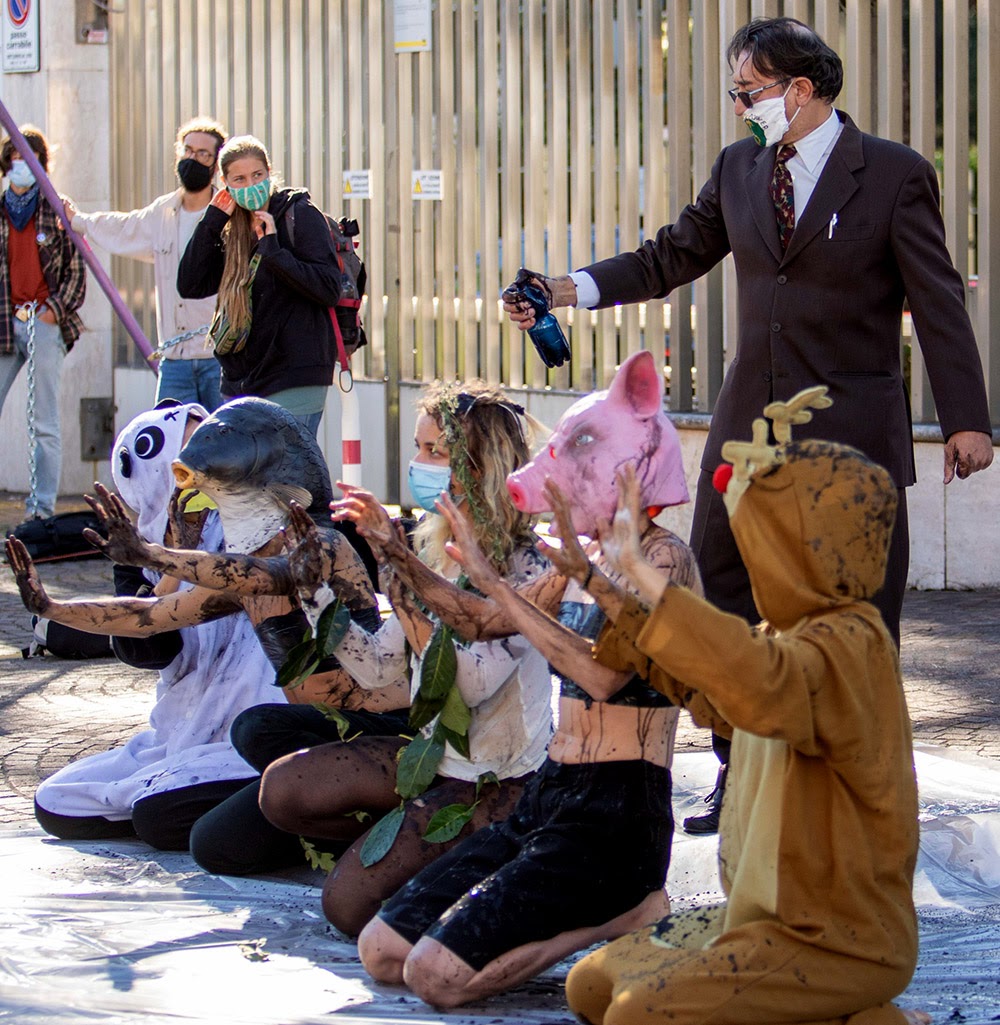 Italian rebels blockade the HQ of national oil company ENI.